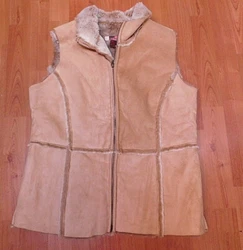 Faux Leather Doeskin Color. Outer shell FEELS like leather, in soft doeskin color. Plush Faux Fur Trim & Lining....
