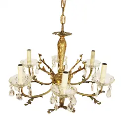 With its antique brass finish, this chandelier is sure to illuminate any setting with its six beautifully crafted...