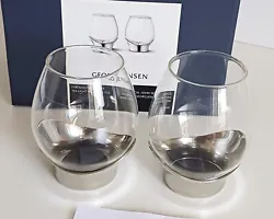 Georg Jensen Grace Glass Tea Light Candle Holders. A pair of glass and stainless steel tea light holders, perfect for a...