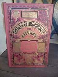 Voyages extraordinaires. Jules Verne. le rouge du dos un peu usé.