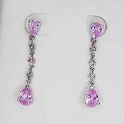 Lab created Pink Sapphires. w/ small diamond accents.