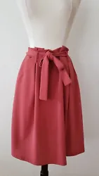 This is a cute skirt. Trendy, soft knit, belted, pockets on both sides, elastic waist. Great addition to any wardrobe....