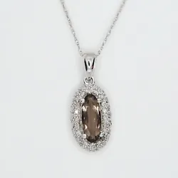 10 x 4 mm elongated smoky quartz. Chain is not included. 0.13 ctw diamonds. 8.6 mm wide.