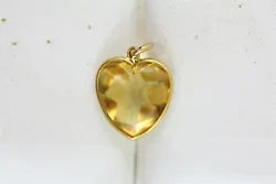 AMAZING NATURAL HEART SHAPED CITRINE WITH A CABOCHON TOP AND FACETED BACK. THE SOLID 14K GOLD HAS A BEAUTIFUL WARM...