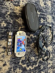 Sony PlayStation Vita Assassin’s Creed III Liberation Bundle White Handheld.... Come with GamesMLB 12 THE...