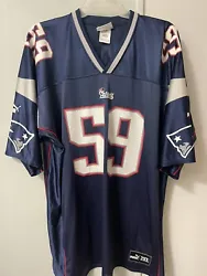 Represent the New England Patriots with this vintage Puma jersey featuring the name and number of legendary linebacker...