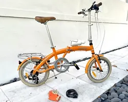 Orange color TOKYO Citizen Bike 16 6-speed Folding Bike. Citizen Tokyo bicycleIncludes extras: rear bike rack, bottle...