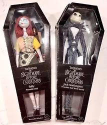 The original ties are still holding them to the box and the Sally doll has the original sewing kit as well.