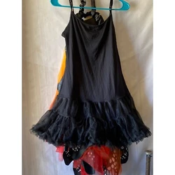 This is so pretty I feel like it is for a young girl not sure about girls sizes probably a medium and then you tie the...