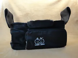 Never used stroller organizer. Velcroed ends. There are wires in the organizer for structure. so it doesnt flop. PHOTOS...