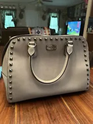 michael kors handbag. very great condition. nothing wrong with bag at all. comes with dust bag and strap