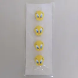 Set of 4 Tweety Bird button covers. They are unused. Covers 1/2