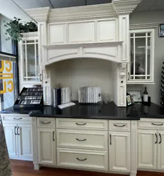 Decora Display wood kitchen cabinets with granite countertop. The kitchen with black countertop is sold, the second...