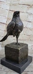 Resting upon a sleek black marble base, this sculpture exudes elegance and sophistication, making it a striking focal...