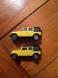 This 1/64 scale diecast Jeep Wrangler set includes two goldish Jeeps made by Maisto in 2015. Perfect for kids aged 3...