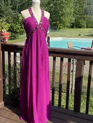 Women’s Purple halter maxi Length dress Size 10 NWT. Few embellishments loose, could be fixed with stitch or two....