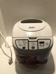 Oster Bread Maker Machine Model 5838 ExpressBake 2 Pound Loaf w/ Paddle White. Condition is Used. Shipped with USPS...