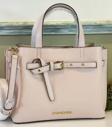 Purse Features Buckle Detailing on Front. Zipper and Magnetic snap closure. Beautiful Leather in Powder Blush. You will...