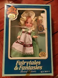 Vintage Fairytales & Fantasies Bookshelf Collectables Mother Hubbard Doll. Condition is 