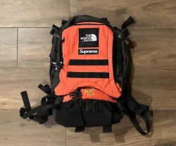 This limited edition backpack from Supreme x The North Face is a must-have for any fashion-forward man. The bright red...