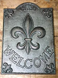 Heres a great cast iron wall plaque. 8 1/2