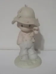 This Precious Moments figurine, titled 