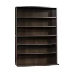 This spacious shelving system boasts a rich cherry finish with cinnamon undertones. This engineered wood piece is ad...