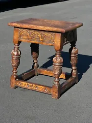 The rich brown color of the oak and the intricate design add to its aesthetic appeal, making it a piece to be...