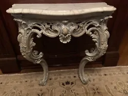 Antique late 18th or early 19th Century Carved Italian or French Marble Top Console Table. Heavily carved of solid wood...