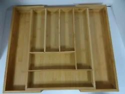 Here is an expandable cutlery silverware/flatware utensil tray. Two of the dividers have bowed a bit as the pictures...