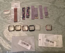 4 Fitbit Versa bands & 6 Screen Protector cases Lot Size Small Bands4 bands, 2 purple fabric bands one with rose gold...