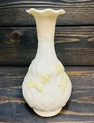Belleek Yellow Flower Vase With Embossed Grape Leaves 7” Tall Ruffled Rim IrelandIn good vintage condition with no...