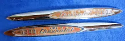 Here is a pair of Chevrolet truck 3200 fender spear emblems in good used condition for your consideration. Most of the...