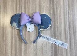 Hi up for sale is a New Disney Parks pair of Minnie Mouse ears headband and the color is blue denim with bleach...