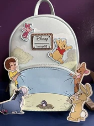 Loungefly Disney Winnie The Pooh 95th Anniversary Celebration Toss Mini Backpack.