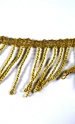 I am selling yardage of vintage gold fringe - BTY. It has a flat edge which is attached to a corded fringe. The...
