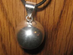 You are looking at a 20MM shiny silver plated harmony ball pendant necklace. It is made of a silver plated brass...