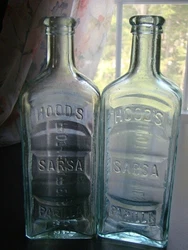 Antique pair ofHOODS SARSAPARILLA/ APOTHECARIES/ C.I. HOOD & Co./ LOWELL, MASS. In excellent condition with just a...