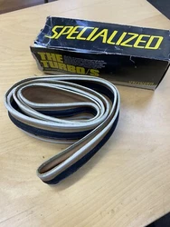 This vintage SPECIALIZED TURBO/S 27x1 Gumwall Folding Tire is a great find for any cycling enthusiast. Made with...
