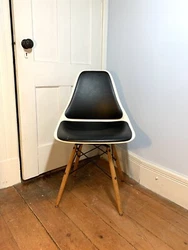 MCM fiberglass swivel shell chair wood dowel base Mid Century Modern White with black padding Condition is...