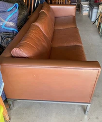 Very comfortable. Six removable cushions. Wear is consistent with age and use; most prominent on front of seat...