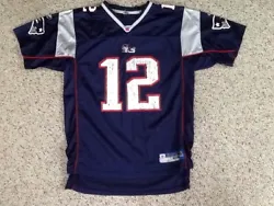 NEW ENGLAND PATRIOTS TOM BRADY FOOTBALL JERSEY WITH LOTS OF GRAPHIC WEAR SIZE IS YOUTH XL