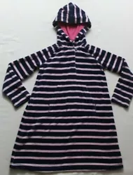 VELVETY SOFT WITH POCKET IN FRONT FOR KEEPING YOUR LITTLE ONES HANDS WARM AND A HOODIE. I am more than happy to answer...
