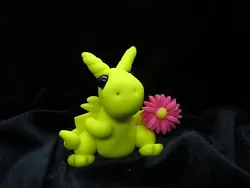 This cute bright yellow dragon has a pink daisy just for you. They are made for mature children to adults. They are...