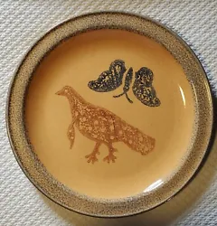 Yellow/gold Stoneware with blue and brown design. Turkey and butterfly design. Inspired by Folk Art designs at the...