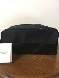 NWT Black Burberry Toiletries Bag. Small scratch on one of the corners. No other issues. Overall in great shape.