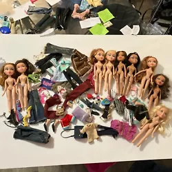 Bratz doll clothing lot with shoes, purses bags, tops pants, skirts and accessories dolls