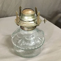 This is a clear glass lamp base made by Eagle.