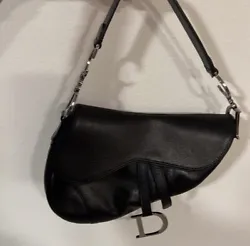Christian Dior Black Leather Saddle Bag with Silver Hardware. Black calfskin with silver chrome hardware. Already been...