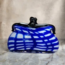 This vintage handblown glass vase is a stunning addition to any room. The piece is in the shape of a purse with blue...